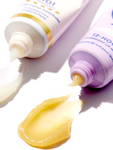 Load image into Gallery viewer, Lip Heroes Day &amp; Night Duo Set close up of tubes showing 101 Ointment Multipurpose Superbalm and 12 Hour Overnight Lip Mask showing being squeezed.
